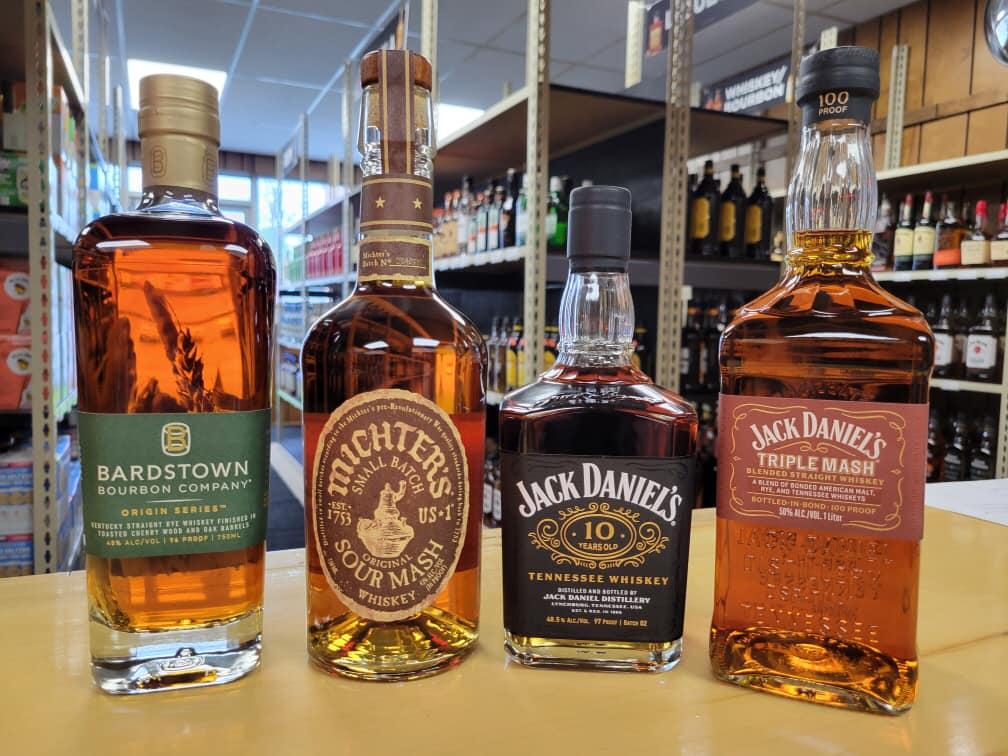 Picture of Bardstown Origin Bourbon, Michter’s Sour Mash Whiskey, Jack Daniel’s 10 Years Old Batch Whiskey, and Jack Daniel’s Triple Mash